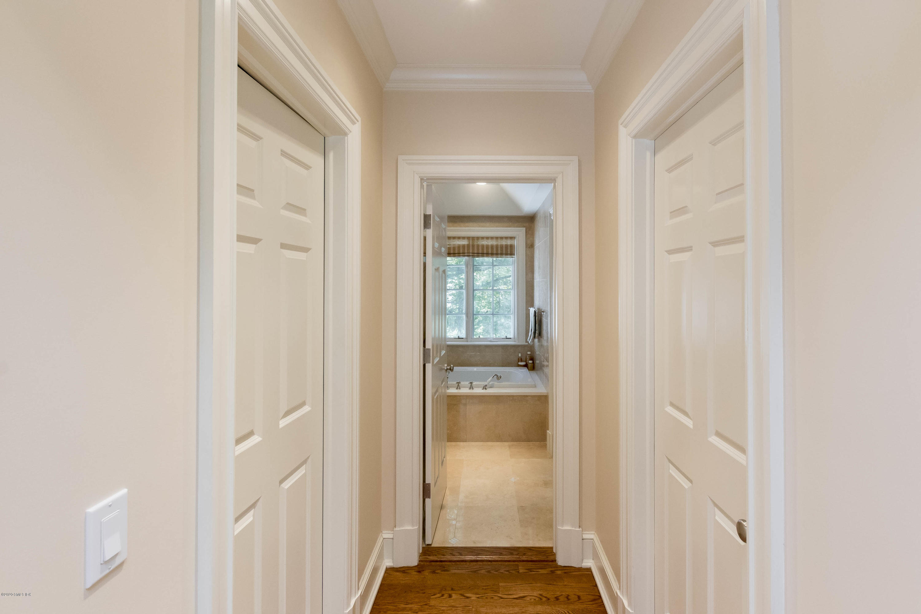 8 Hockanum Road Westport, CT 06880 - Photo 21 of 41 a view of a bathroom from a hallway
