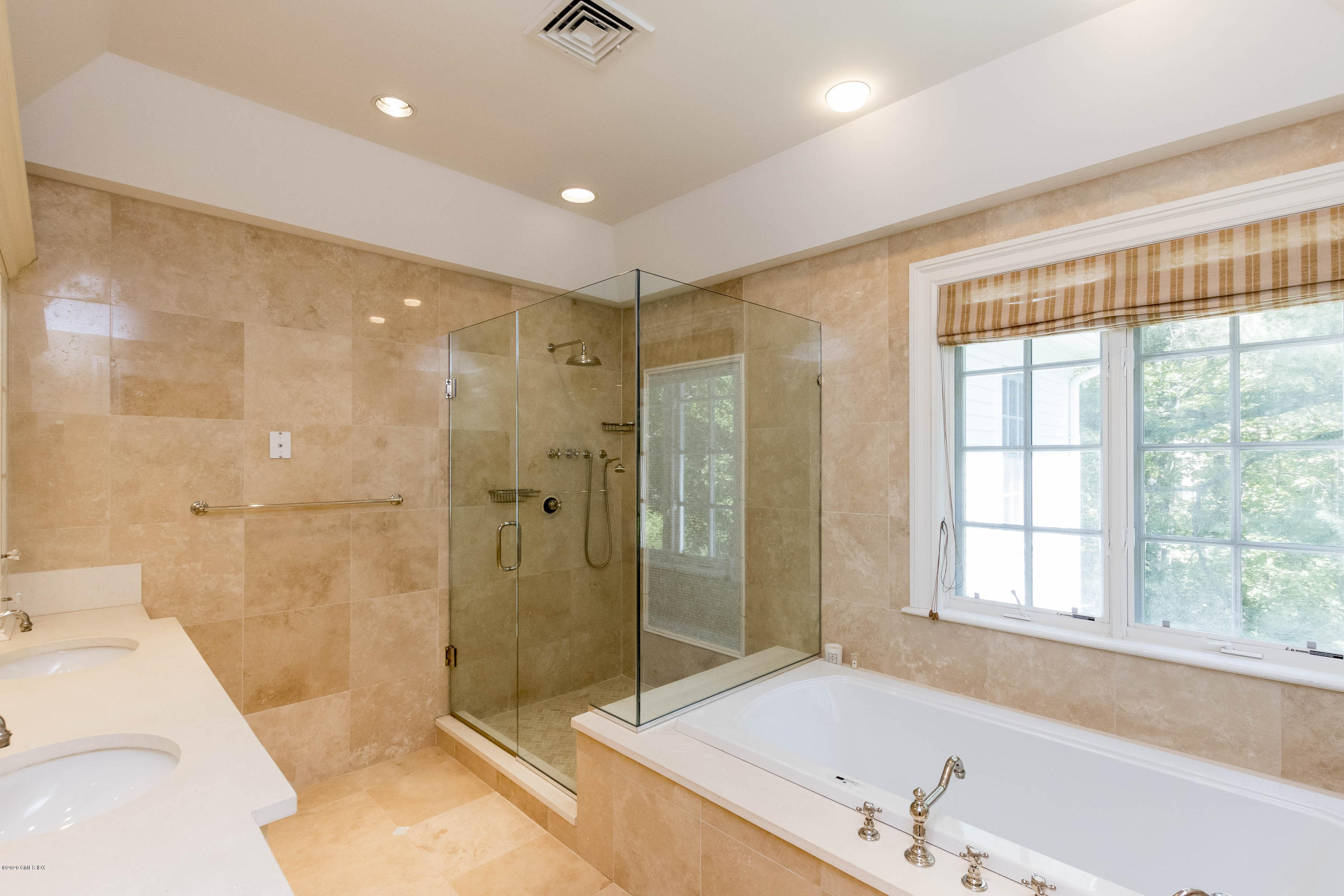 8 Hockanum Road Westport, CT 06880 - Photo 22 of 41 a spacious bathroom with a tub shower and sink