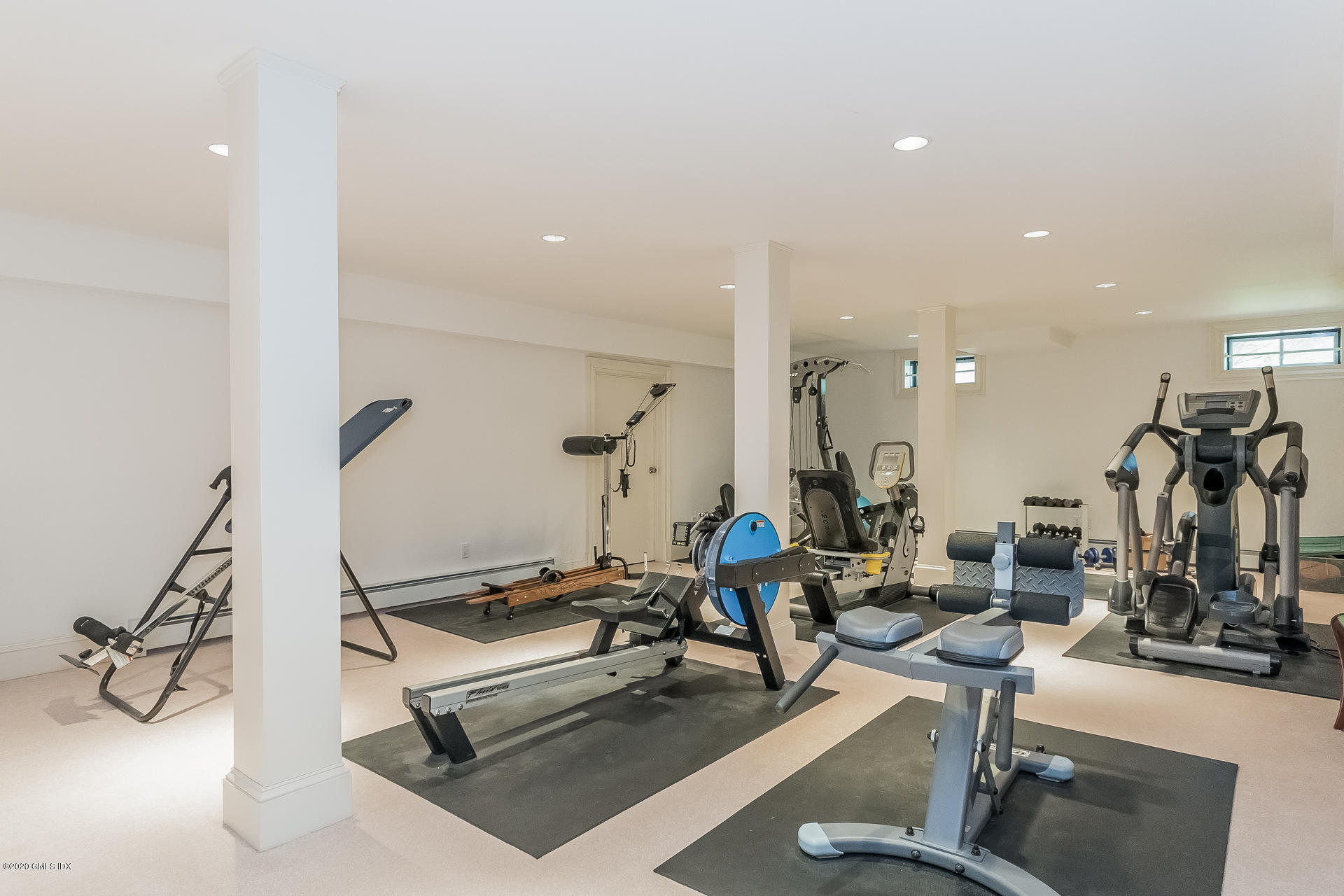 8 Hockanum Road Westport, CT 06880 - Photo 32 of 41 a room with gym equipment and wooden floor
