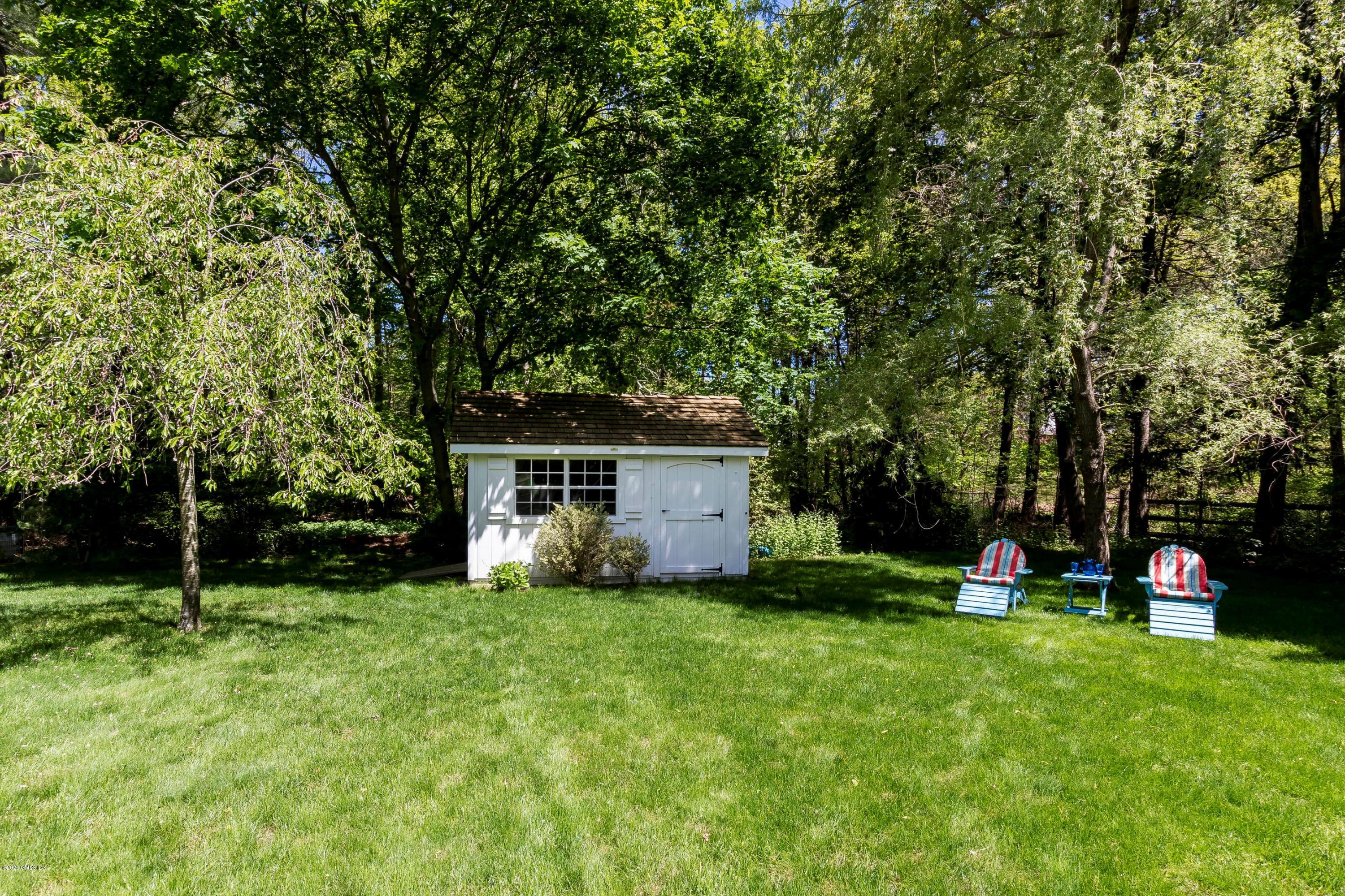 8 Hockanum Road Westport, CT 06880 - Photo 35 of 41 a view of a house with a yard and tree