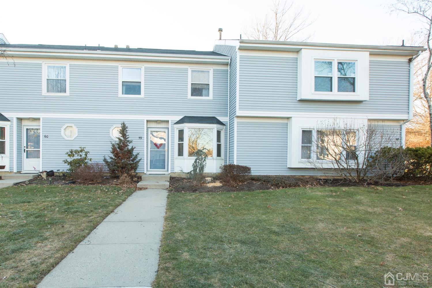 59 La Rue Lane East Brunswick, NJ 08816 - Photo 1 of 18 front view of a house with a yard