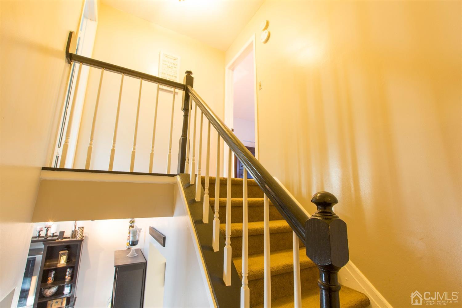 59 La Rue Lane East Brunswick, NJ 08816 - Photo 13 of 18 a view of balcony with wooden floor