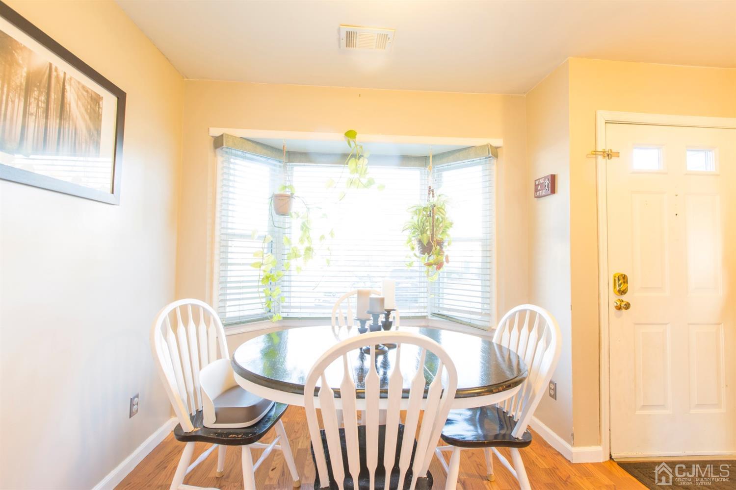 59 La Rue Lane East Brunswick, NJ 08816 - Photo 16 of 18 a view of a dining room with furniture window and outside view
