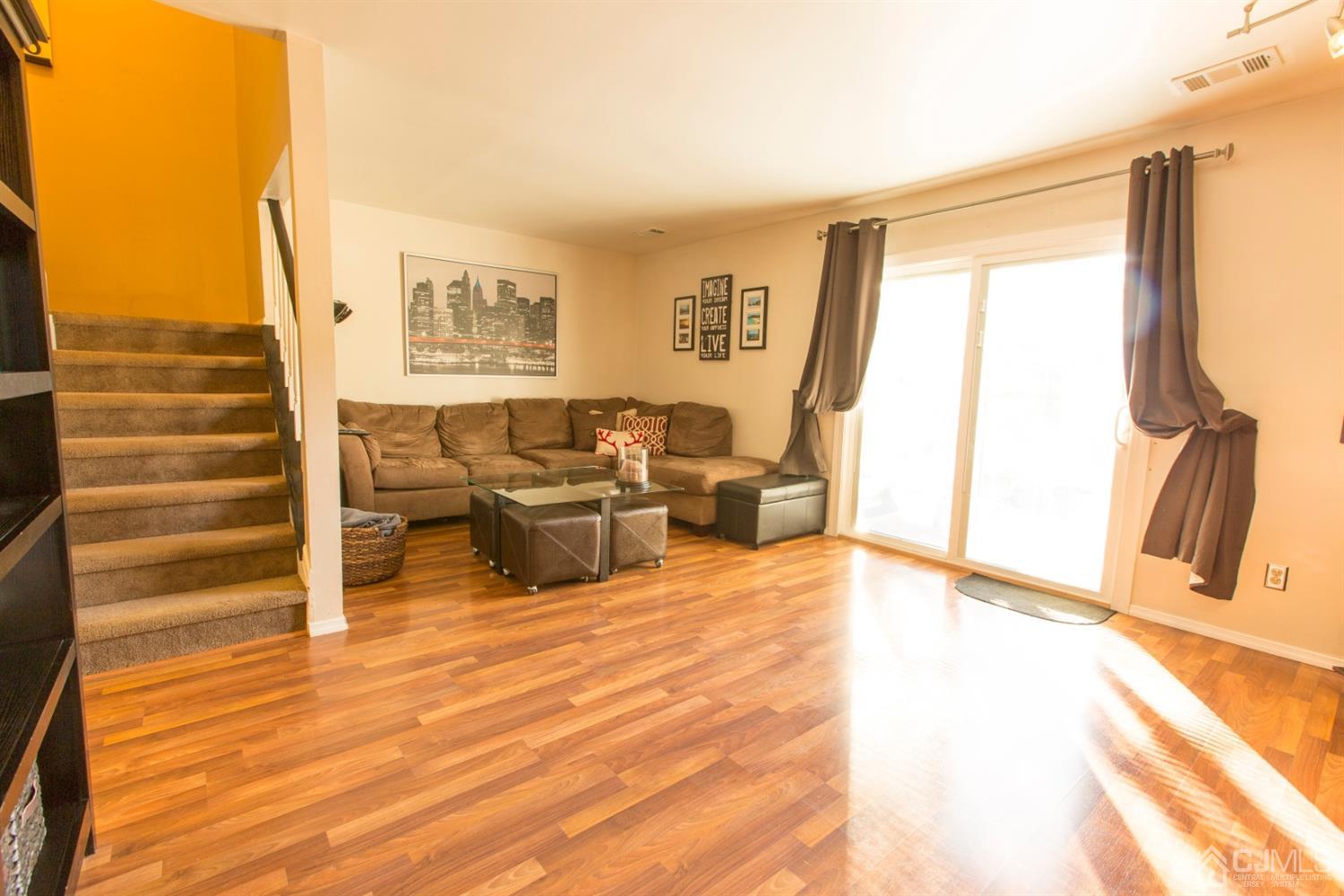 59 La Rue Lane East Brunswick, NJ 08816 - Photo 5 of 18 a living room with furniture window and wooden floor