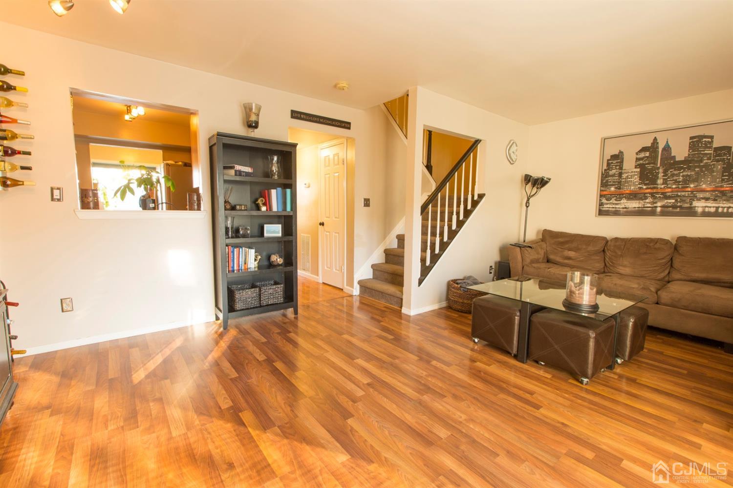 59 La Rue Lane East Brunswick, NJ 08816 - Photo 6 of 18 a living room with furniture and wooden floor
