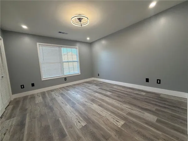 an empty room with windows