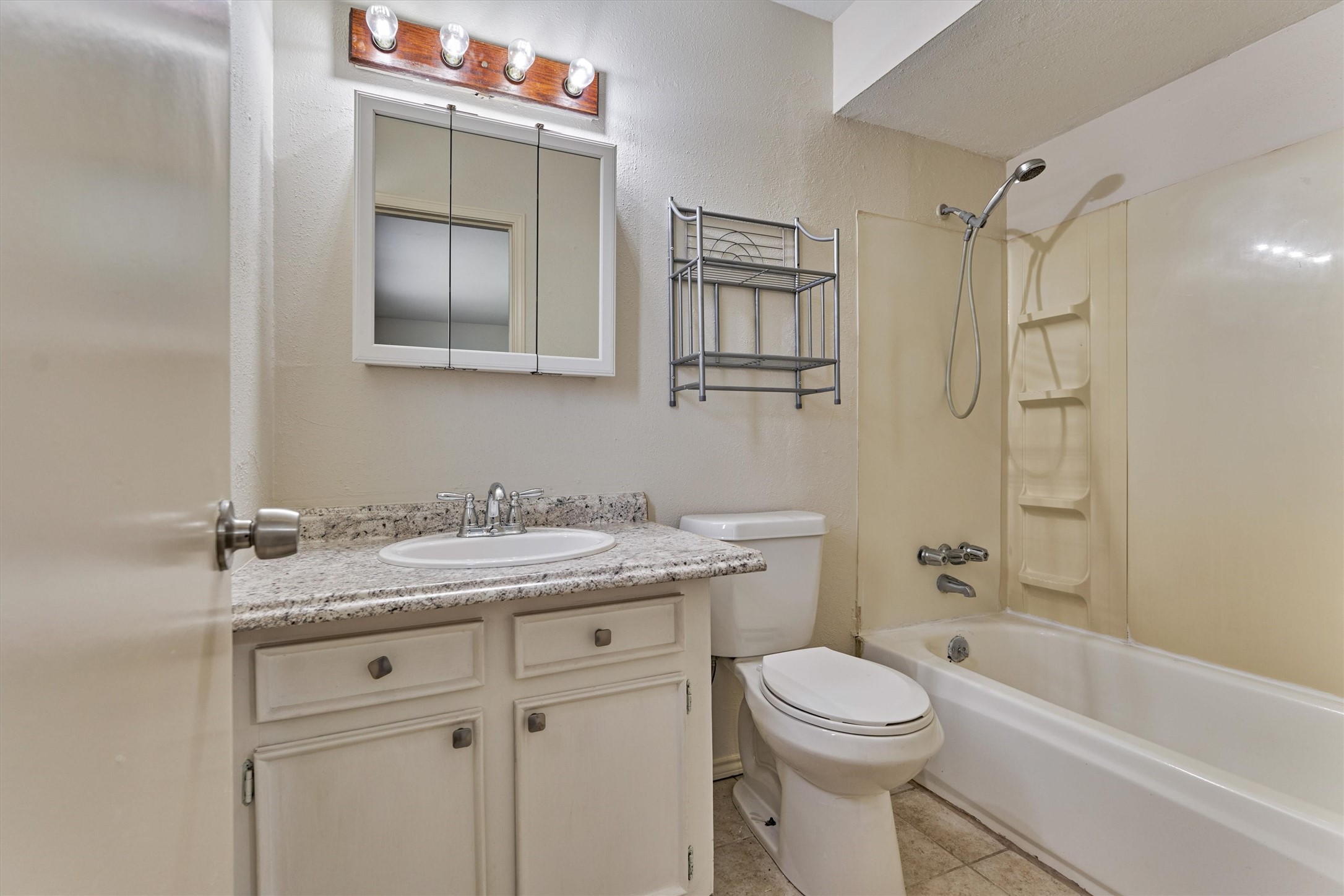 29318 Waltham Street Spring, TX 77386 - Photo 22 of 28 a bathroom with a granite countertop sink toilet and shower