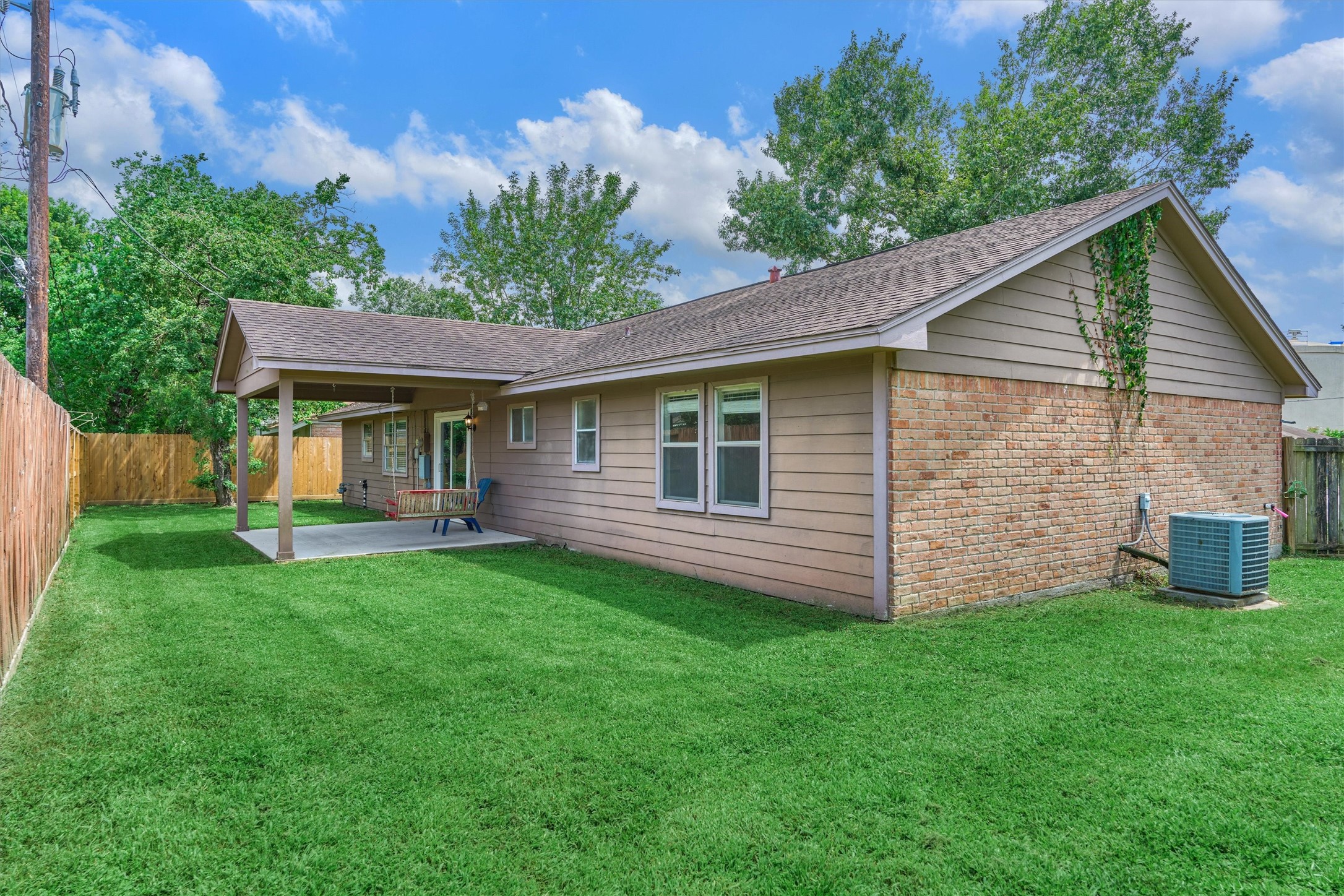 29318 Waltham Street Spring, TX 77386 - Photo 27 of 28 a view of a house with a yard