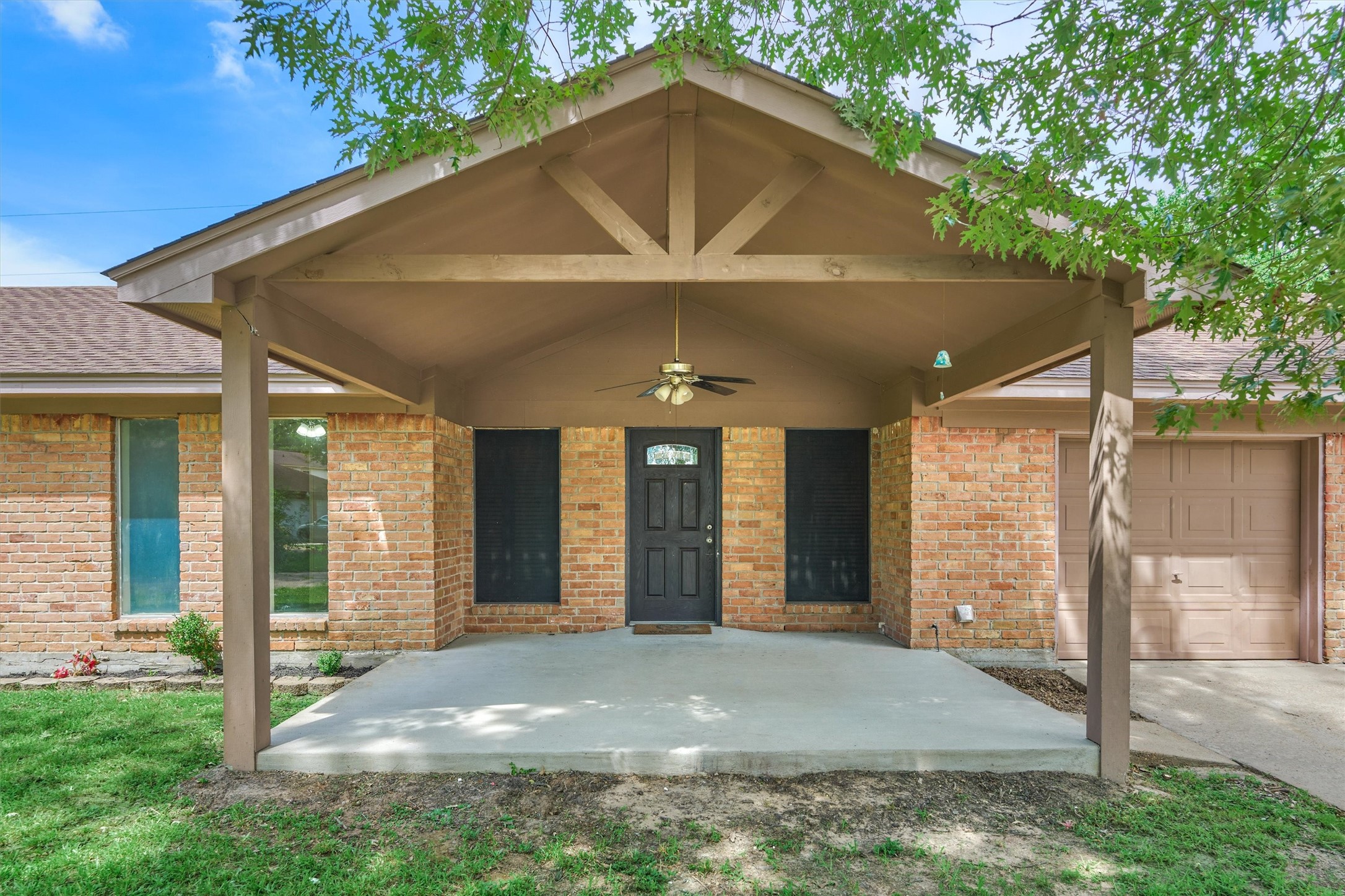 29318 Waltham Street Spring, TX 77386 - Photo 4 of 28 a front view of a house with a yard