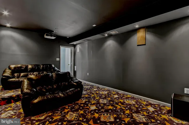 a front view of a building with dining area and glass door