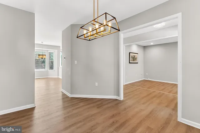 a kitchen with granite countertop a sink and a stove