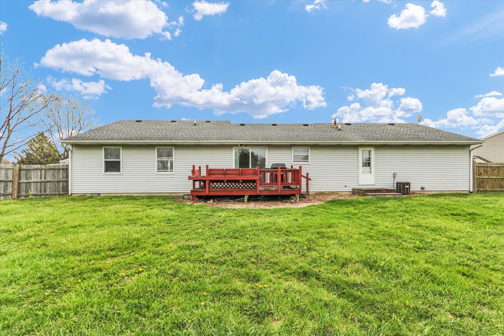 3330 West William Street Champaign, IL 61821 - Photo 7 of 28 a view of house with backyard space and balcony