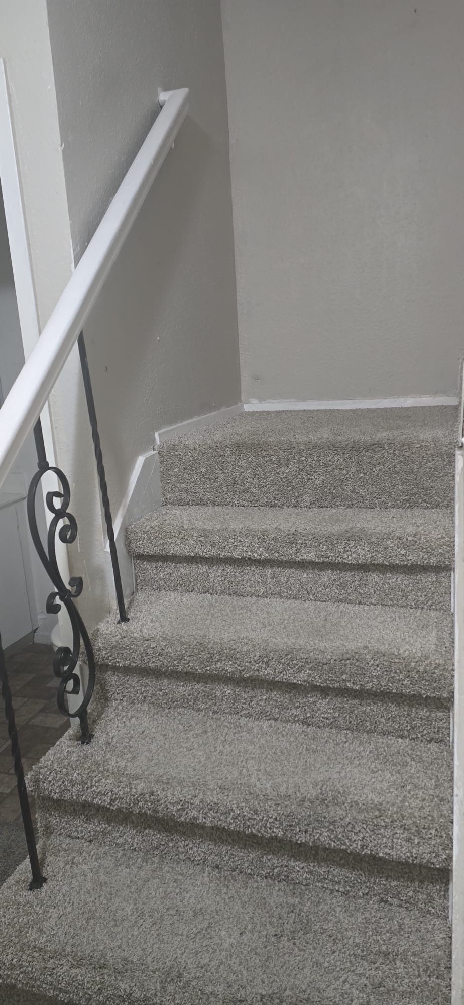 6200 West Tidwell Road, Unit 1205 Houston, TX 77092 - Photo 24 of 27 a view of staircase with white walls