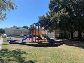6200 West Tidwell Road, Unit 1205 Houston, TX 77092 - Photo 25 of 27 a view of a swimming pool with sitting area