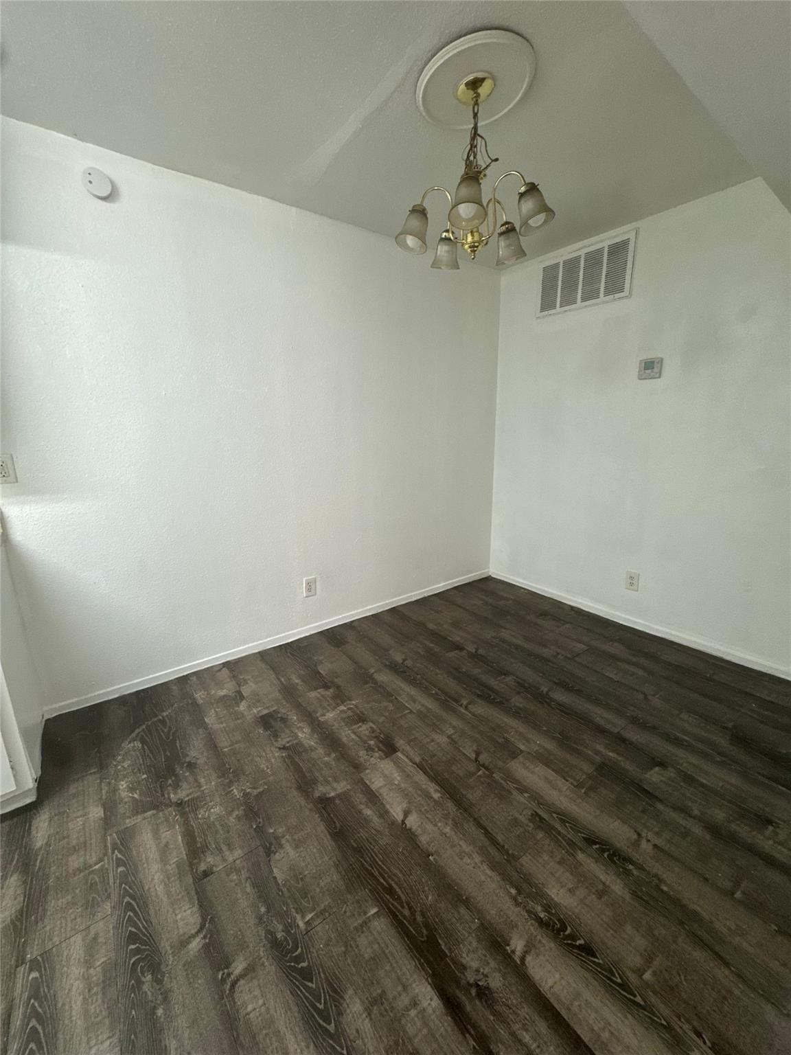 6200 West Tidwell Road, Unit 1205 Houston, TX 77092 - Photo 6 of 27 a view of a livingroom with a chandelier fan