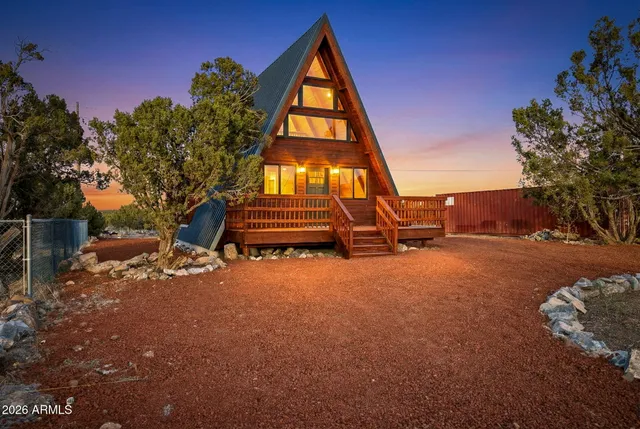 a view of swimming pool with a yard