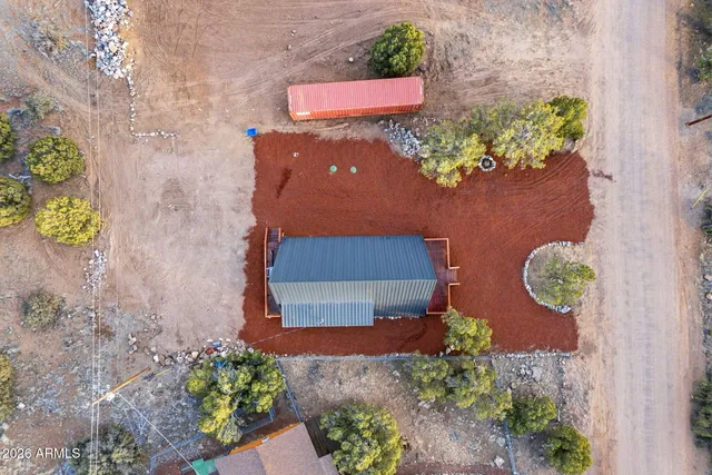 a view of balcony with wooden floor and outdoor seating