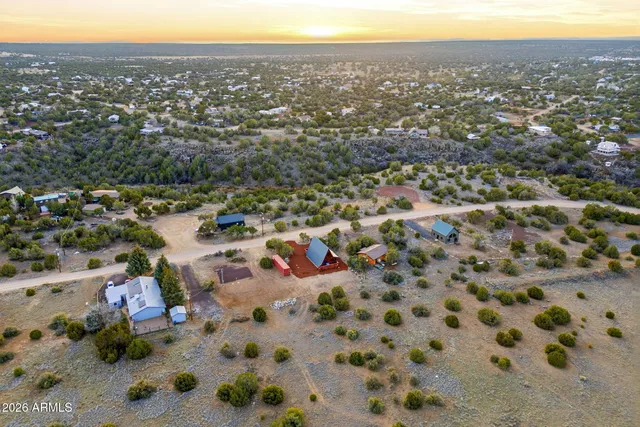 a view of a road with a yard
