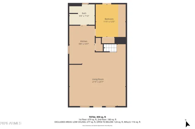 a backyard of a house with wooden fence and trees