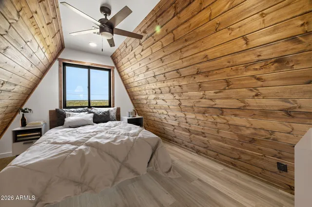 a large kitchen with a refrigerator and a sink