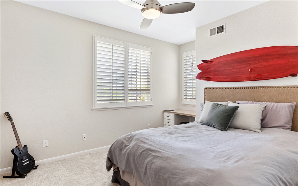 3445 Camino Alegre Carlsbad, CA 92009 - Photo 16 of 25 a bedroom with a bed and a window