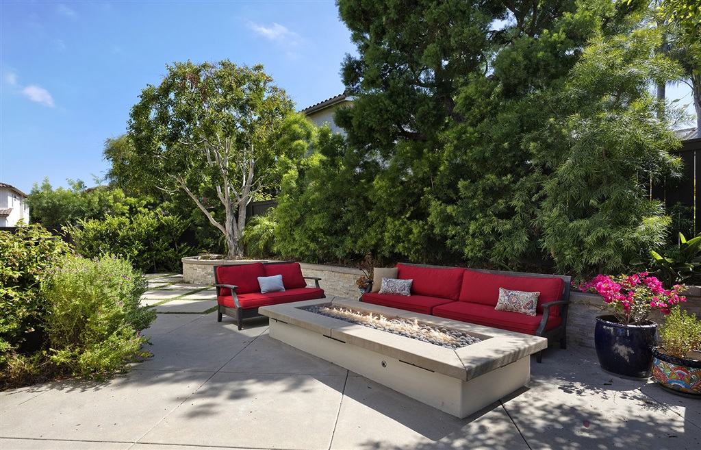 3445 Camino Alegre Carlsbad, CA 92009 - Photo 22 of 25 a view of a bench in the back yard of the house