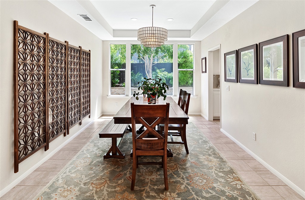 3445 Camino Alegre Carlsbad, CA 92009 - Photo 3 of 25 a dining room with furniture window and outside view