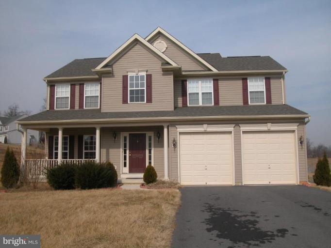 103 Ripe Berry Lane Martinsburg, WV 25403 - Photo 1 of 19 a view of a yard in front of a house