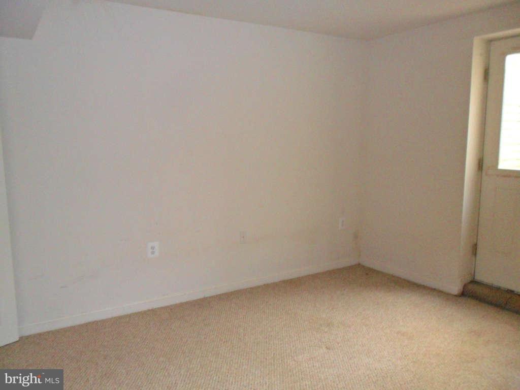 103 Ripe Berry Lane Martinsburg, WV 25403 - Photo 14 of 19 a view of an empty room and a window