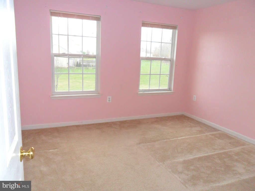 103 Ripe Berry Lane Martinsburg, WV 25403 - Photo 17 of 19 an empty room with a window