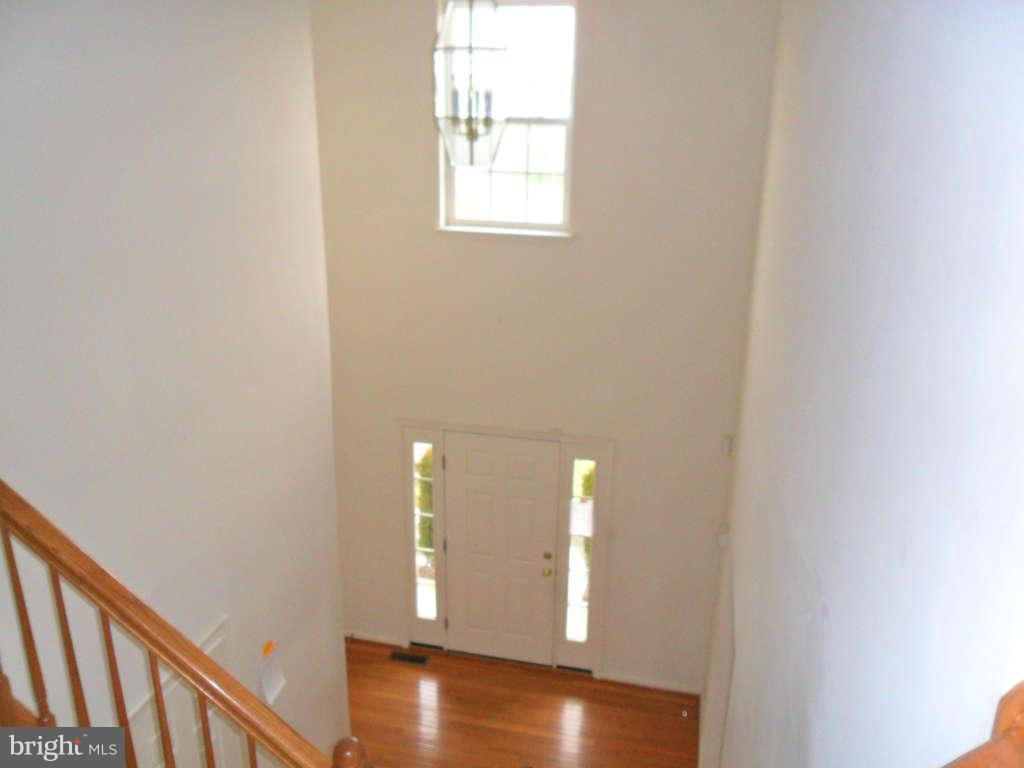 103 Ripe Berry Lane Martinsburg, WV 25403 - Photo 18 of 19 a view of a hallway with window