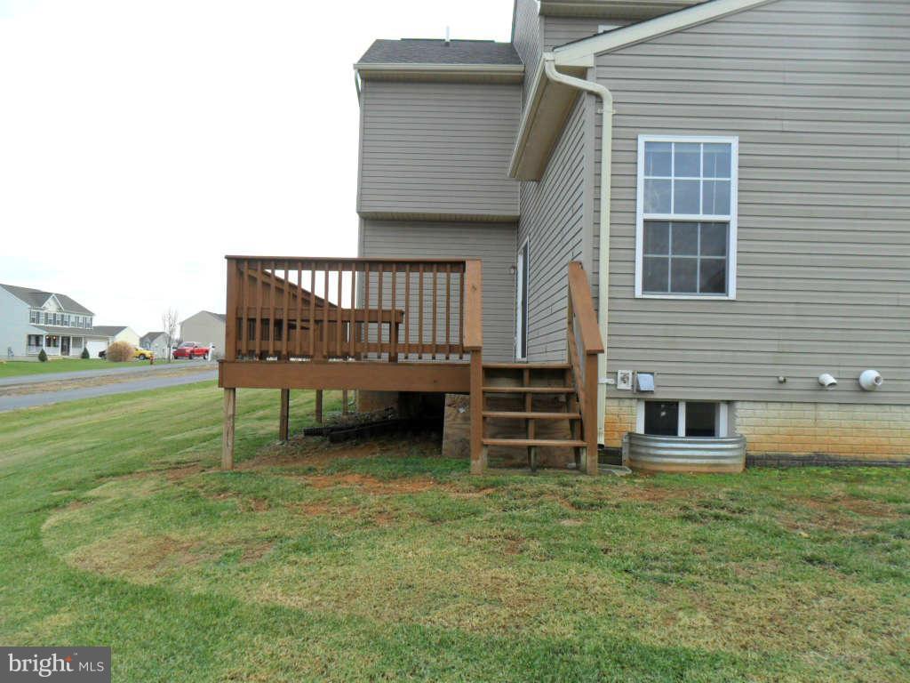 103 Ripe Berry Lane Martinsburg, WV 25403 - Photo 5 of 19 a view of a house with a backyard