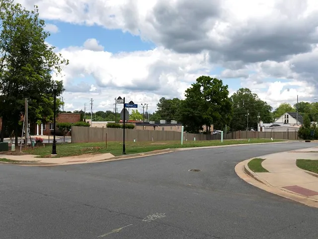 a view of swimming pool with a yard and entertaining space
