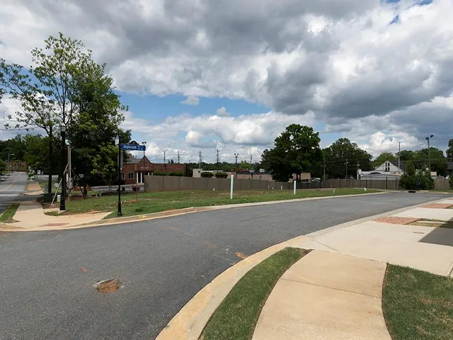 a view of a playground with basketball court