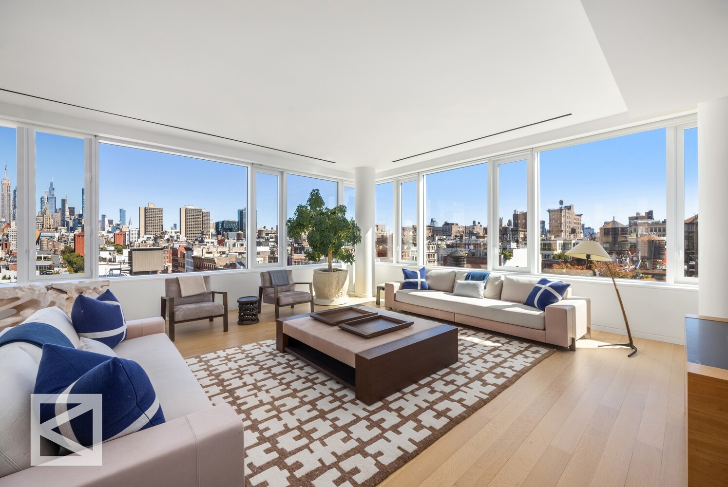350 West Broadway, Unit PH Manhattan, NY 10013 - Photo 13 of 32 a living room with furniture and a large window