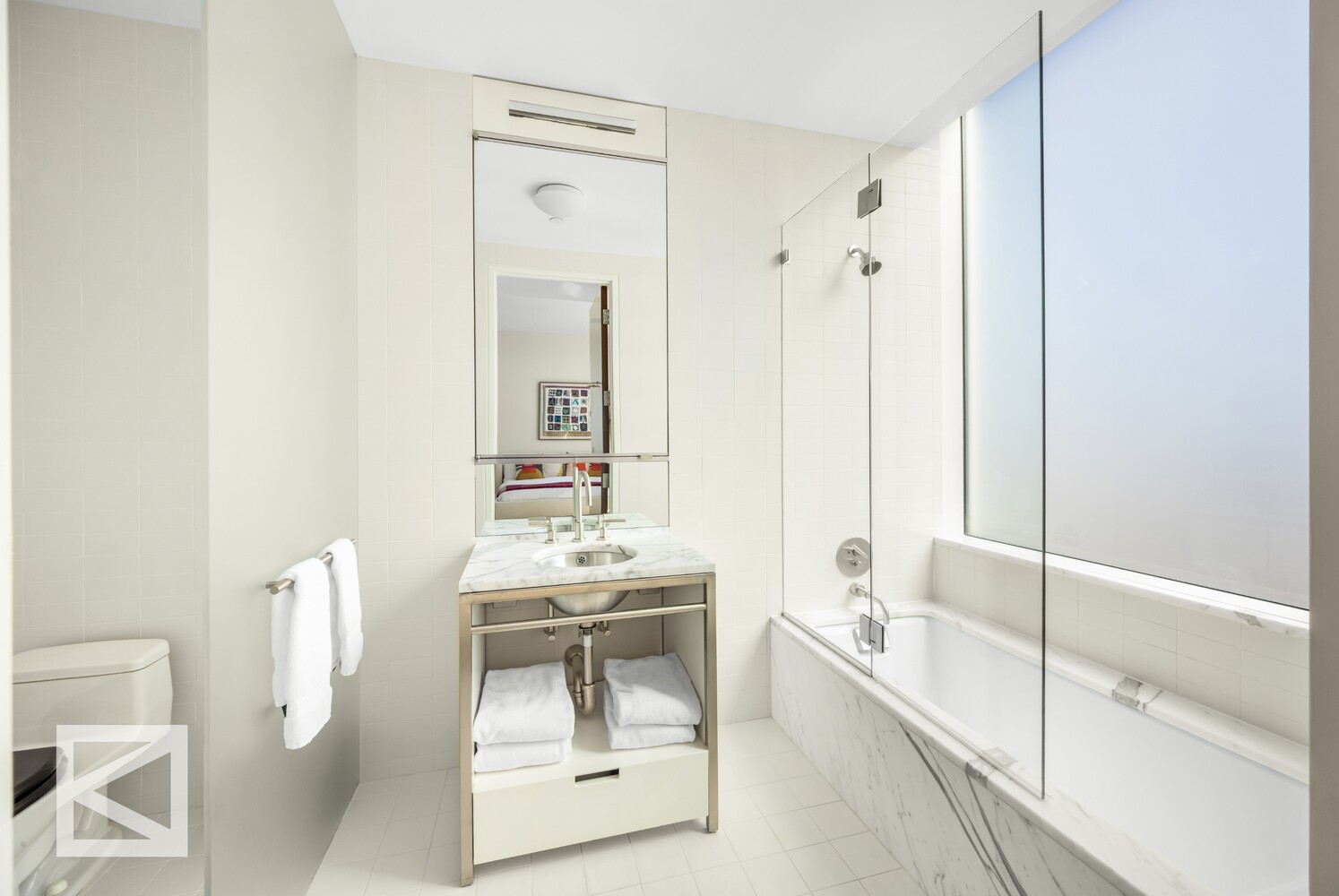 350 West Broadway, Unit PH Manhattan, NY 10013 - Photo 17 of 32 a spacious bathroom with a tub shower and mirror