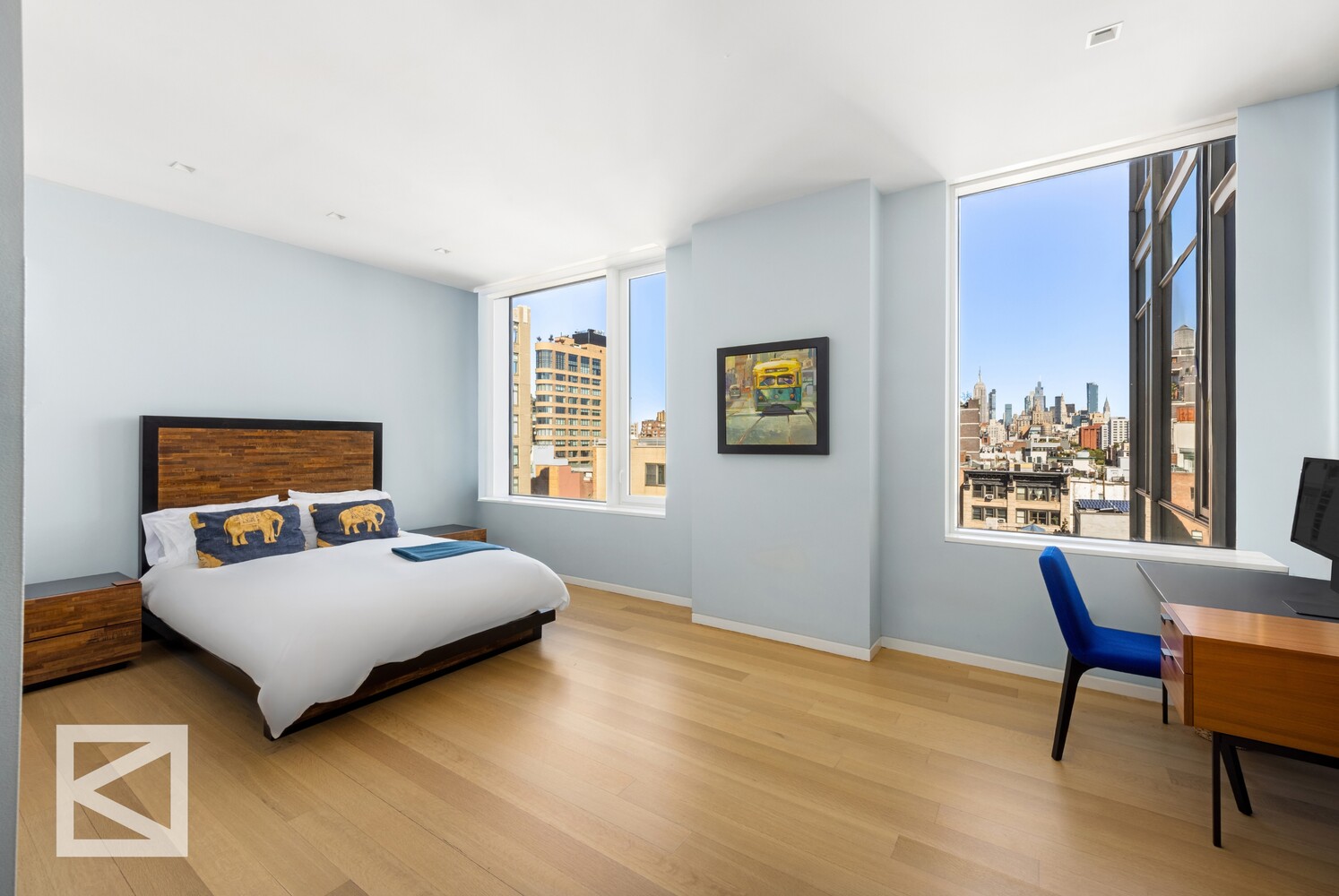 350 West Broadway, Unit PH Manhattan, NY 10013 - Photo 20 of 32 a bedroom with a bed window and a table