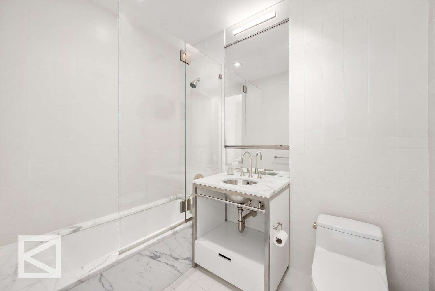 350 West Broadway, Unit PH Manhattan, NY 10013 - Photo 23 of 32 a bathroom with a sink a toilet and shower
