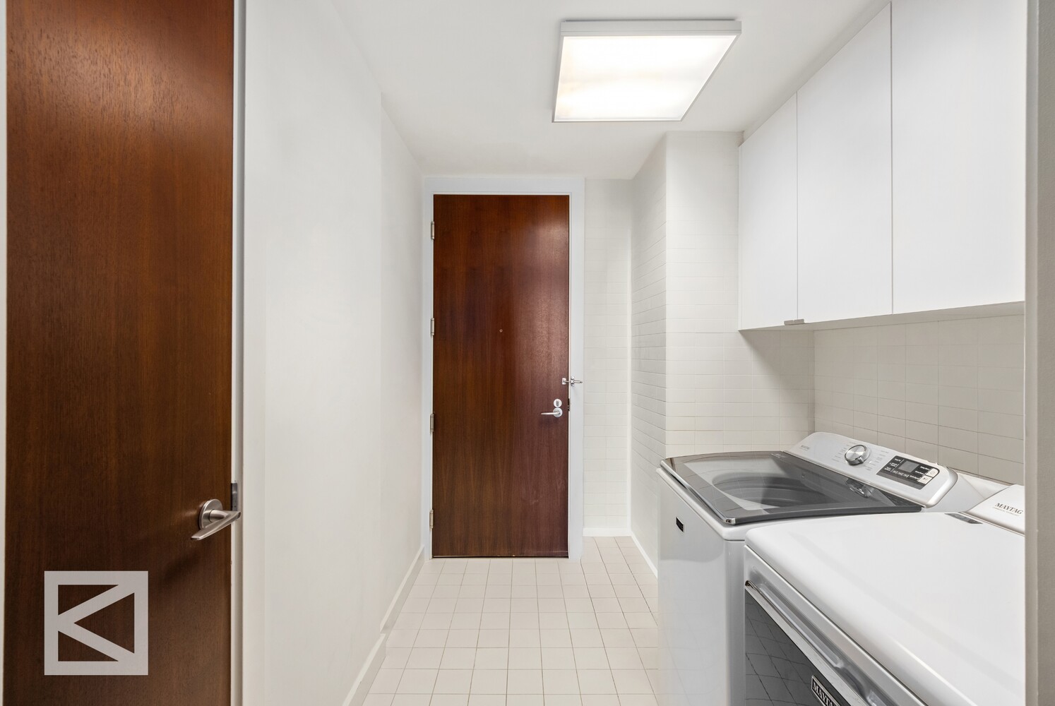 350 West Broadway, Unit PH Manhattan, NY 10013 - Photo 24 of 32 a kitchen with a stove and a refrigerator