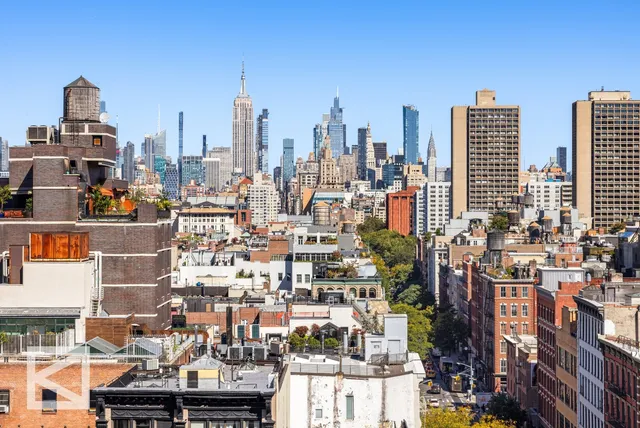 a kitchen with a stove and a refrigerator