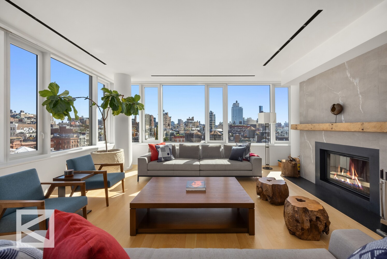 350 West Broadway, Unit PH Manhattan, NY 10013 - Photo 2 of 32 a living room with furniture fireplace and a large window