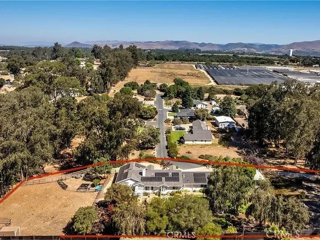 a picture of a bathroom with a shower