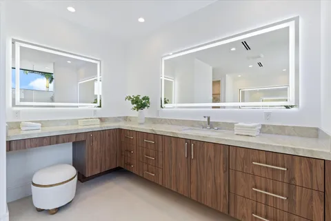 a view of an empty room with glass door