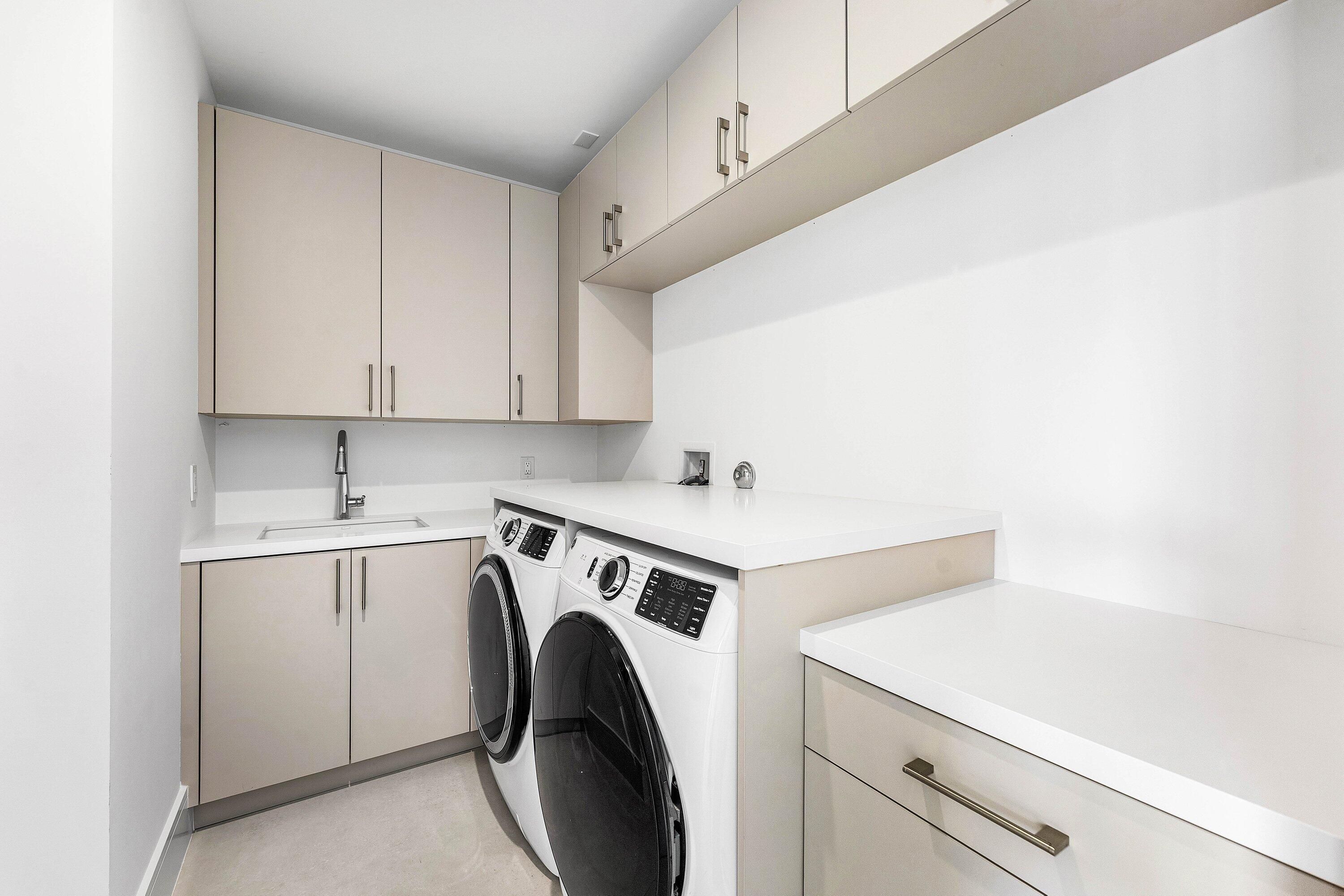 498 Northeast 6th Street Boca Raton, FL 33432 - Photo 38 of 60 a utility room with dryer and washer