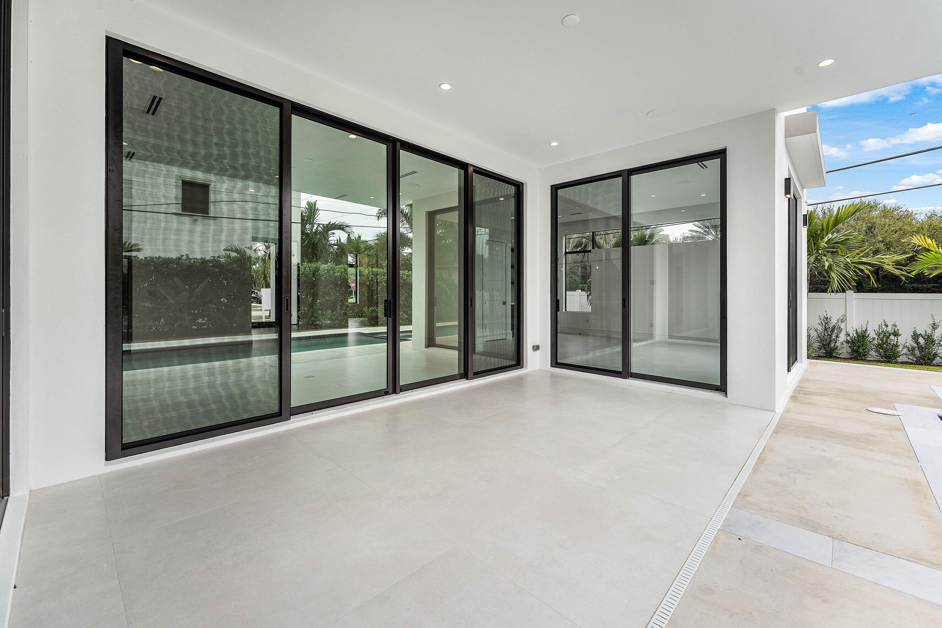 498 Northeast 6th Street Boca Raton, FL 33432 - Photo 48 of 60 a view of an empty room with glass door