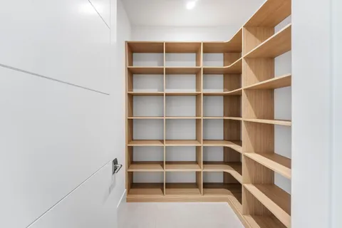 a view of livingroom with furniture and floor to ceiling window