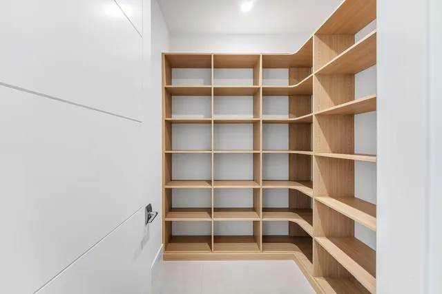 a view of livingroom with furniture and floor to ceiling window