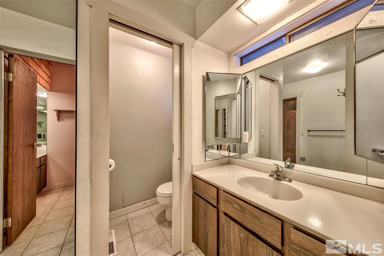 347 Cottonwood Court Incline Village, NV 89451 - Photo 16 of 25 a bathroom with a sink and a mirror