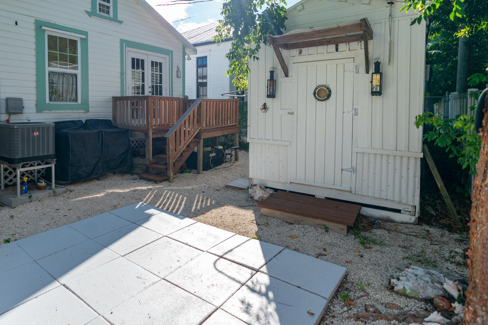 198 Beach Road Tavernier, FL 33070 - Photo 11 of 15 a view of backyard with a garden and seating area