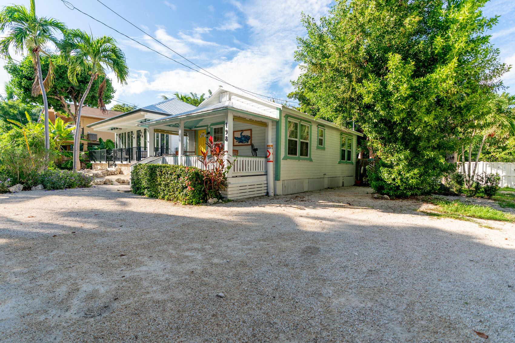 198 Beach Road Tavernier, FL 33070 - Photo 15 of 15 a view of a house with a garden